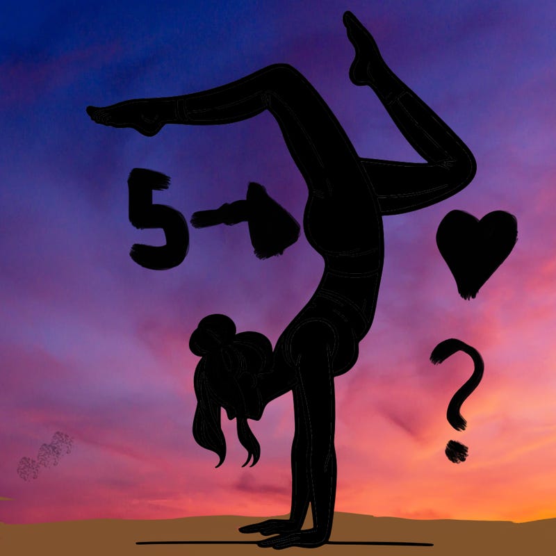 a woman doing a handstand