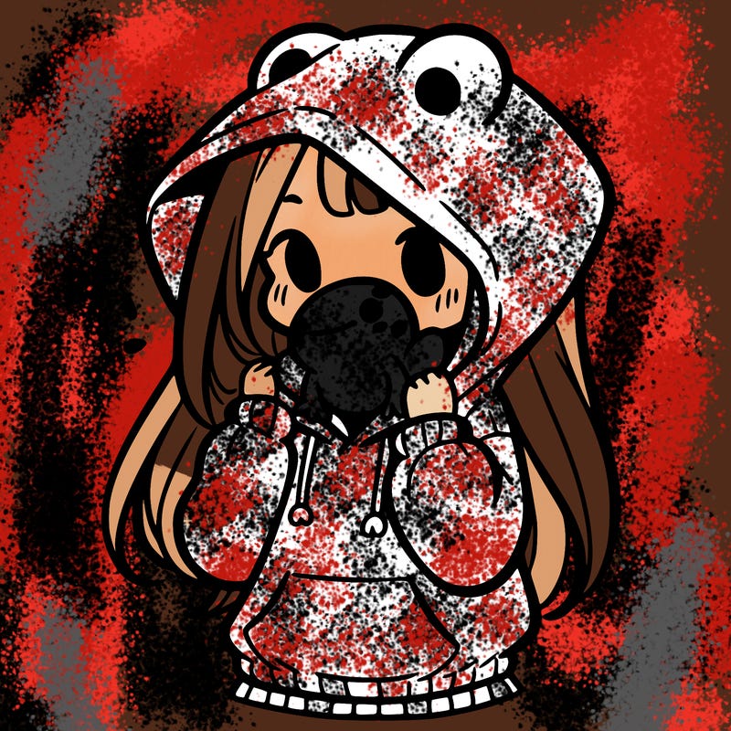 a girl holding a froggy hoodie