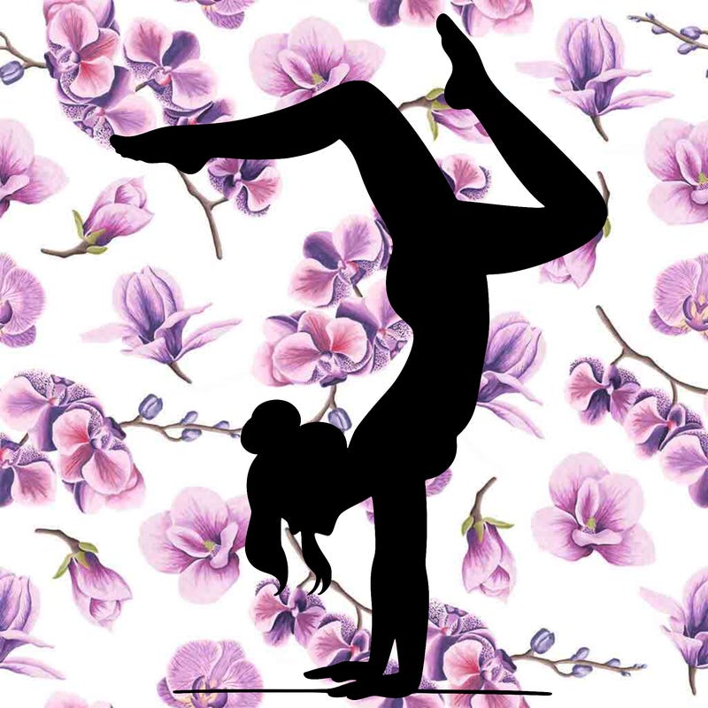 a woman doing a handstand