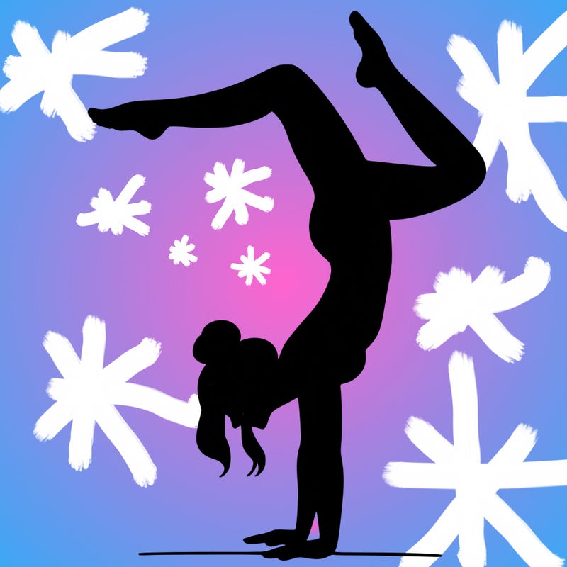 a woman doing a handstand