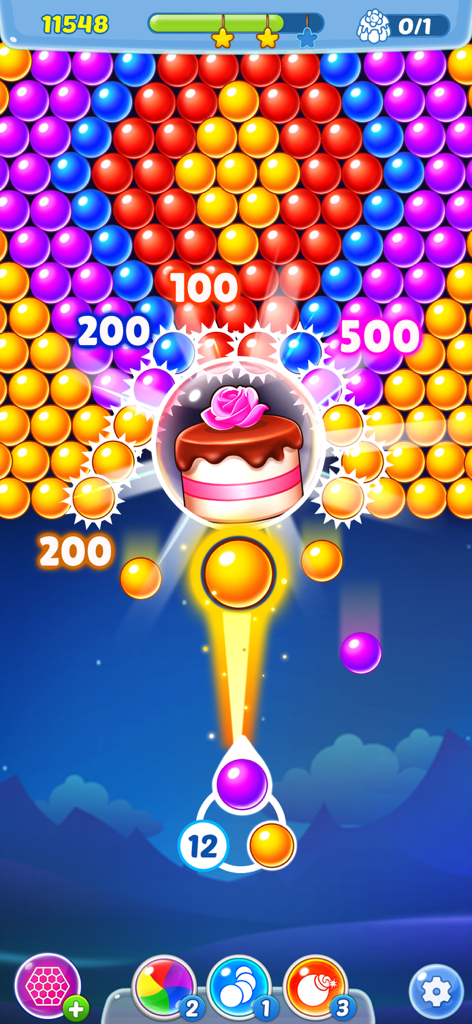 Gameplay of Bubble Shooter Pastry Pop with colorful bubbles and a chocolate cake reward