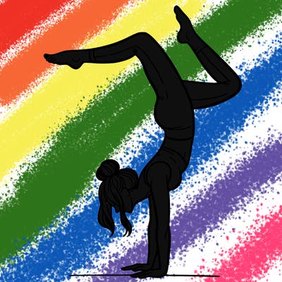 a woman doing a handstand