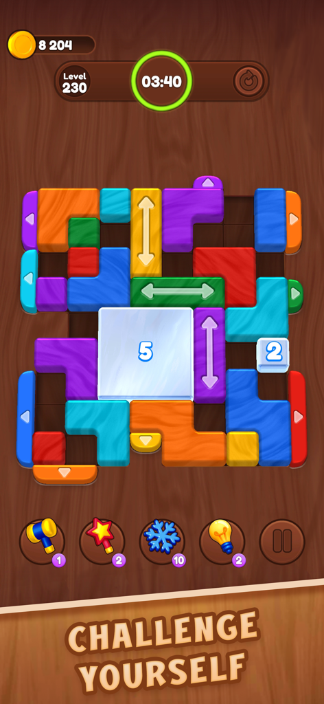 Nivel del juego móvil Color Wood Jam con bloques de madera coloridos y obstáculos de hielo en una cuadrícula.
