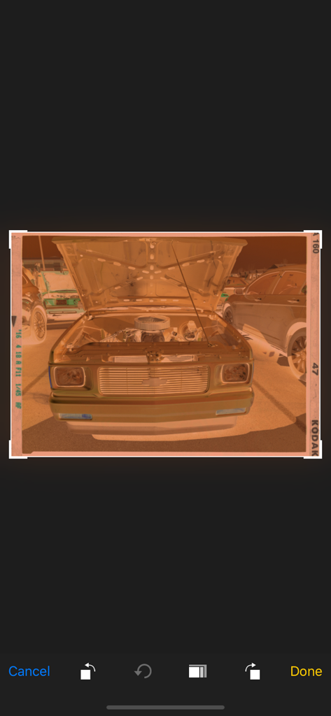 Film scanner Pro - A film negative of a vintage car being edited and cropped in the Film scanner Pro app