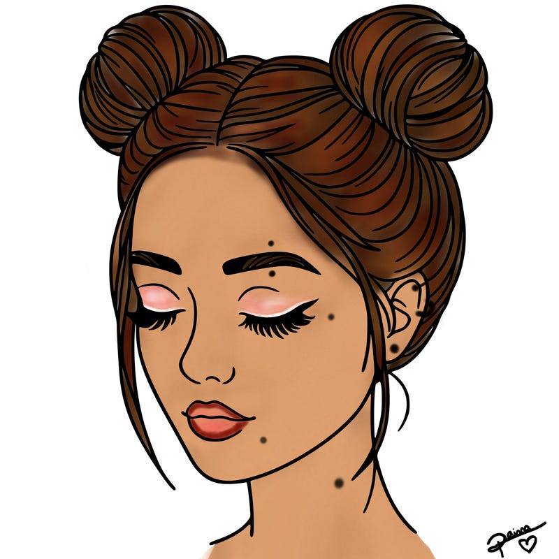 woman with hair buns