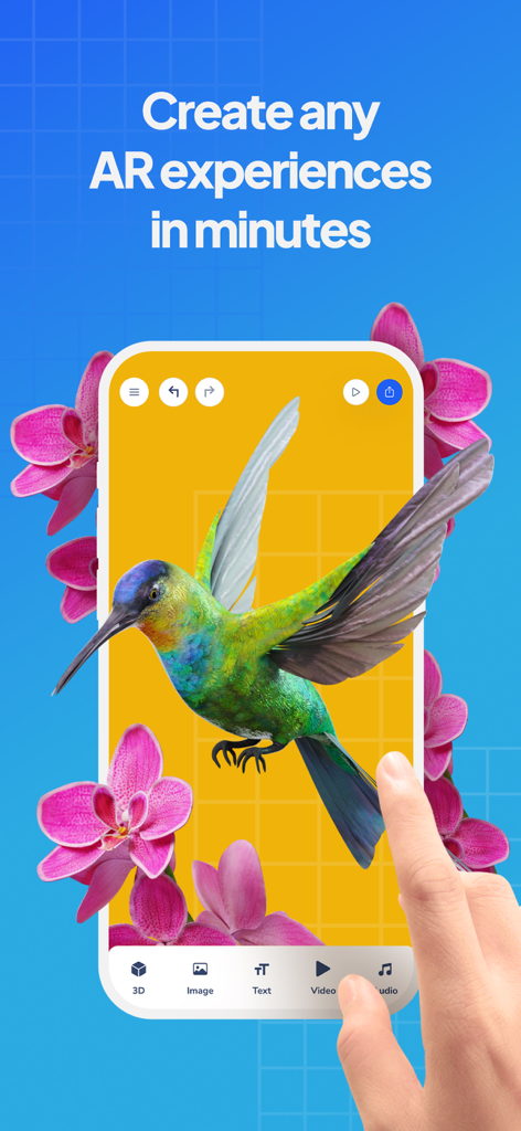 Assemblr Studio: Easy AR Maker - Un smartphone mostrando la interfaz de la aplicación Assemblr Studio con un colibrí y flores en 3D siendo editados en RA