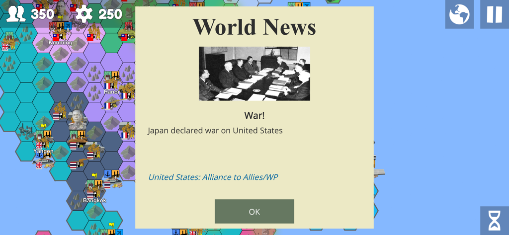 Armchair Commander - A World News pop up in Armchair Commander showing Japan declaring war on the United States over a strategic hex map