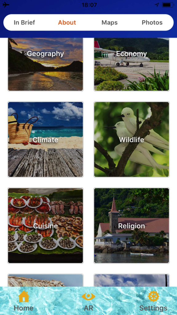 Über-Seite der Seychellen Reiseführer-App mit lokalen Informationskategorien wie Geografie und Tierwelt.