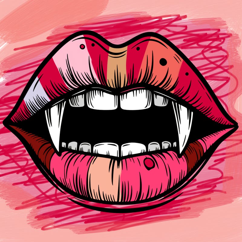 lips with vampire teeth