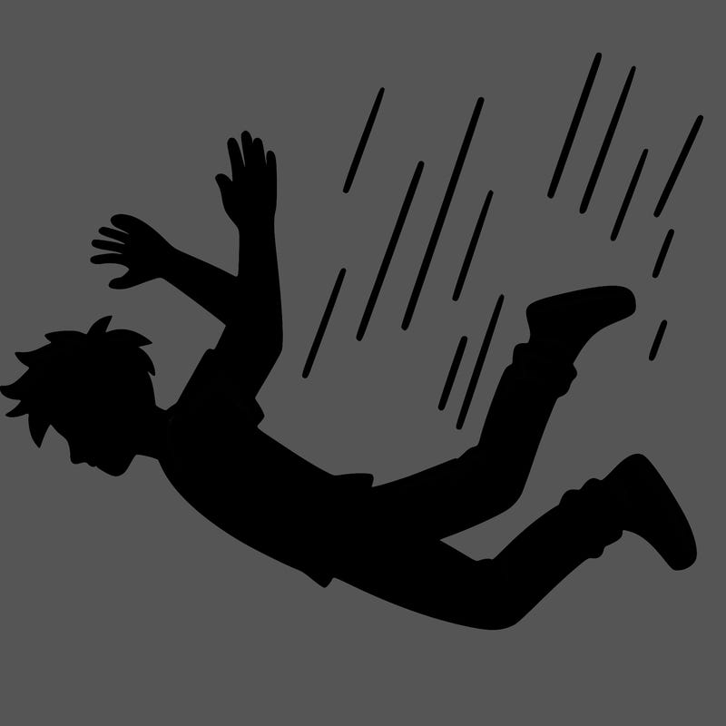 a silhouette of someone falling