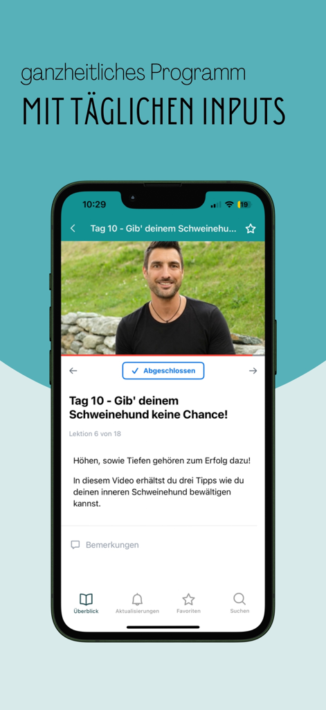 EMF Content - Pantalla de aplicación móvil que muestra un programa de salud holística con consejos diarios de mentalidad y entrenamiento por video