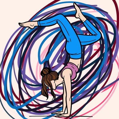 a woman doing a handstand