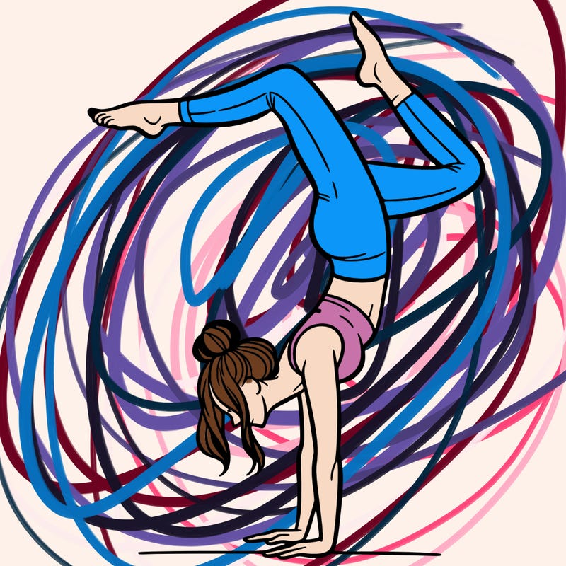 a woman doing a handstand