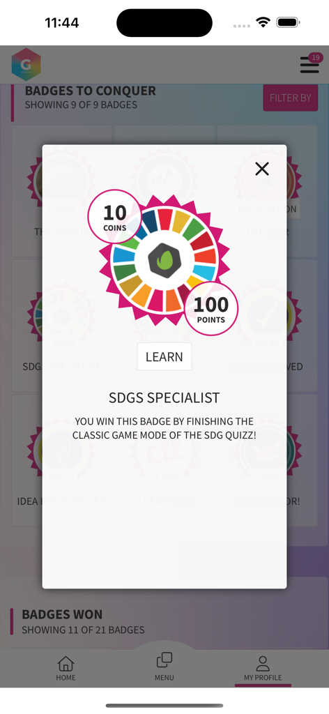 GFoundry - GFoundry App-Bildschirm, der ein gamifiziertes Erfolg-Abzeichen für einen SDG-Spezialisten mit virtuellen Münzen und Punkten zeigt.