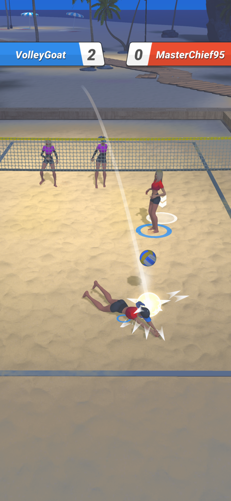 A player performing a diving save in Beach Volley Clash on a sand court at night.