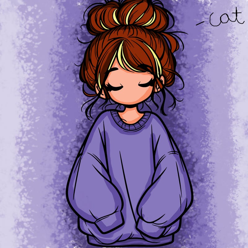 girl with baggy sweatshirt and messy bun