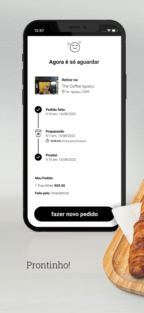 The Coffee - Order tracking screen of The Coffee app with a minimalist interface showing the preparation timeline and pick-up location.