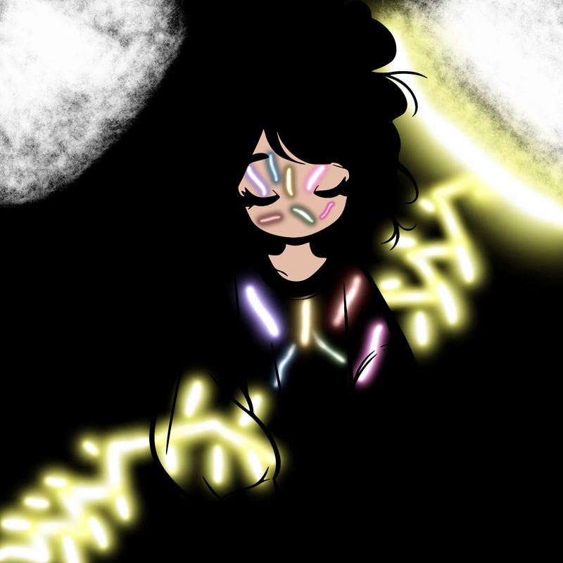 girl with baggy sweatshirt and messy bun