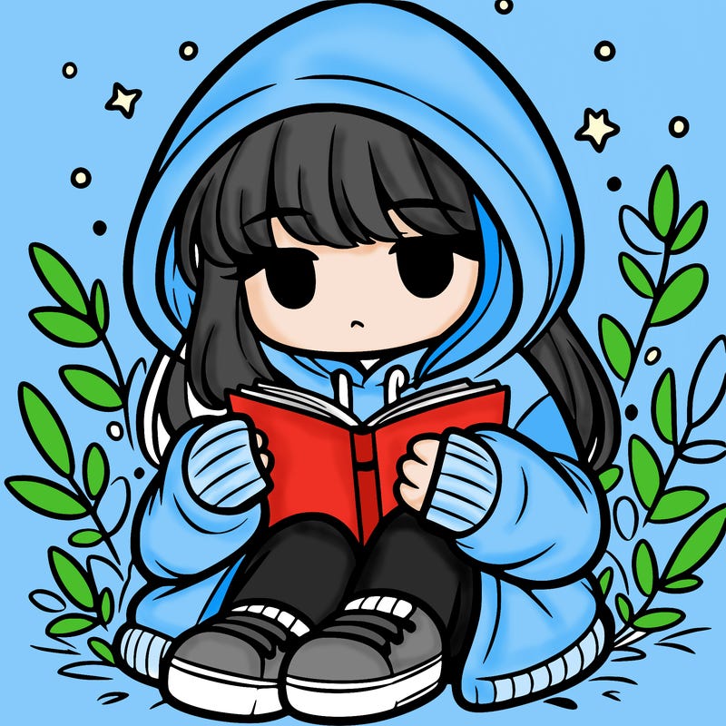 girl in oversized hoodie reading a book