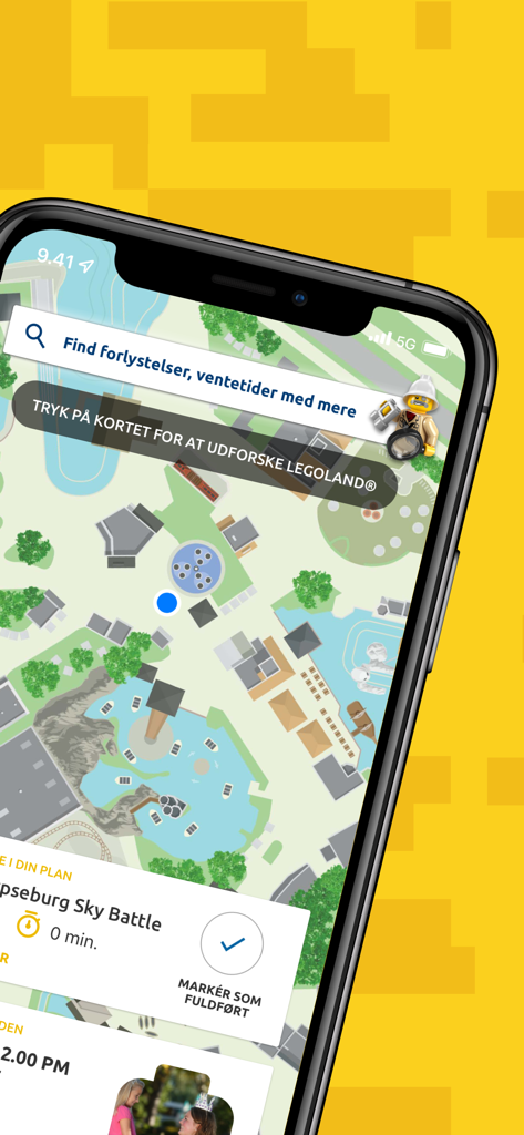 LEGOLAND® Billund Resort - Mobile phone displaying the interactive map of LEGOLAND Billund Resort with ride locations and visitor wait times.