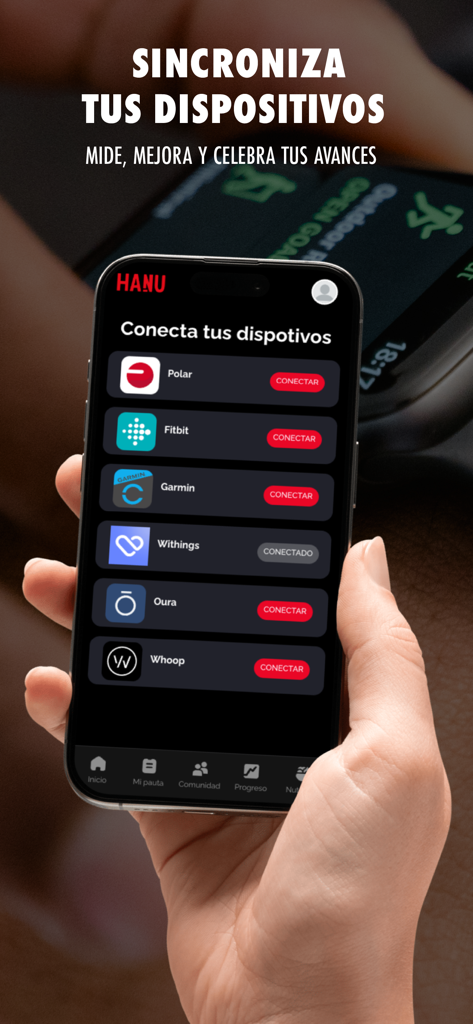 HANU Fit - Interface of the HANU Fit app in Spanish showing options to connect wearable devices like Fitbit and Garmin