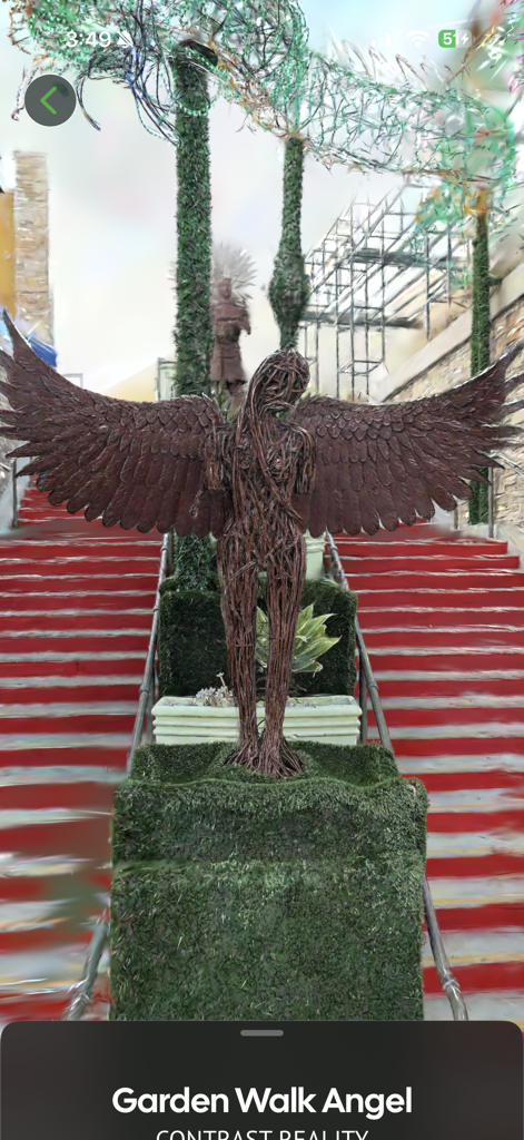A high fidelity 3D Gaussian Splatting render of a winged statue in the spatial fields app