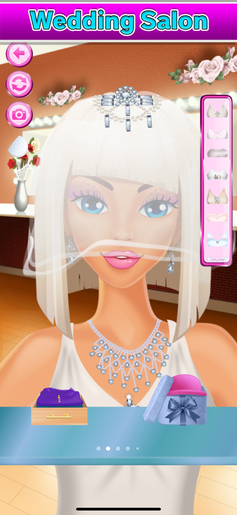 A bridal model with a veil and jewelry in the Wedding Salon makeover screen.