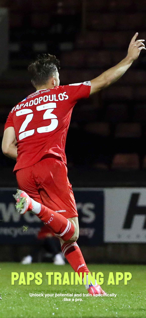 PAPS Training - A professional soccer player celebrating on the pitch with PAPS Training app branding