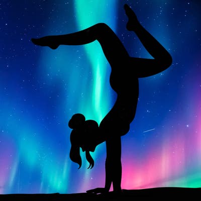 a woman doing a handstand