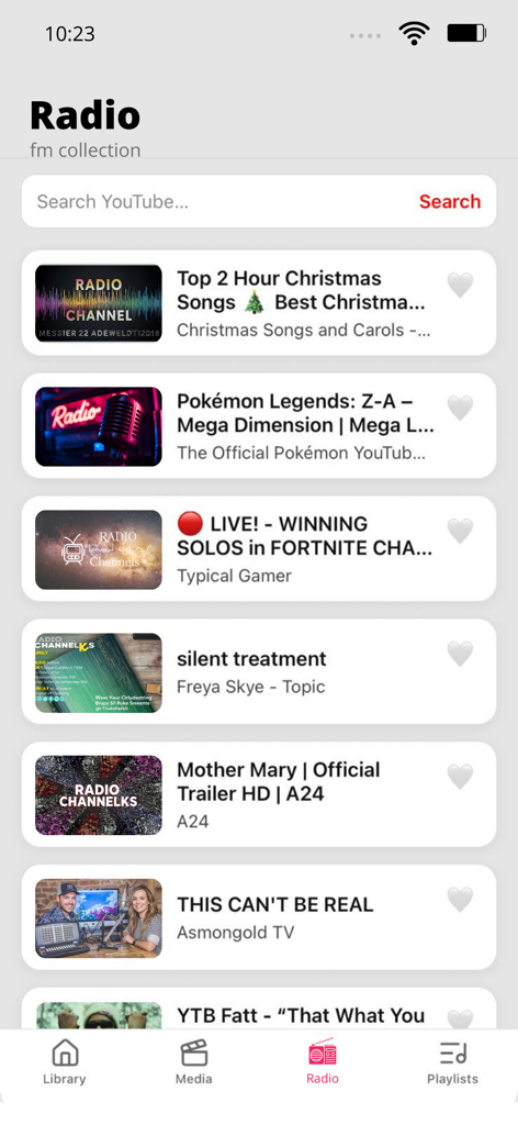 Tubidy FM : Music, Song Player - Pantalla de radio de la app Tubidy FM mostrando una barra de búsqueda y una lista de videos musicales.