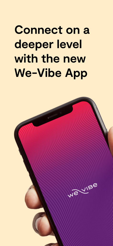 Hand holding a smartphone displaying the We-Vibe app splash screen with the message Connect on a deeper level