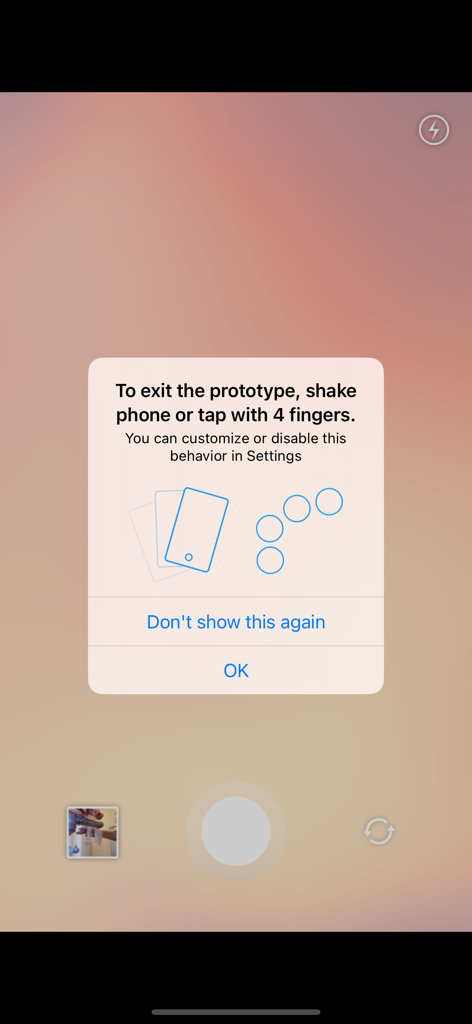 Origami Live - A modal popup in Origami Live providing instructions on how to exit a prototype using shake or four-finger tap gestures.