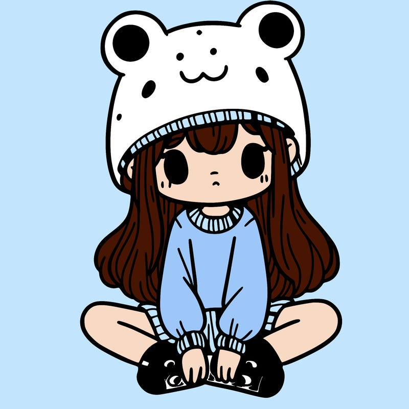 a girl wearing a frog hat and some frog socks