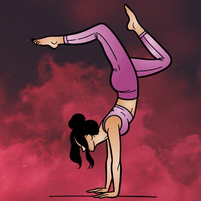 a woman doing a handstand