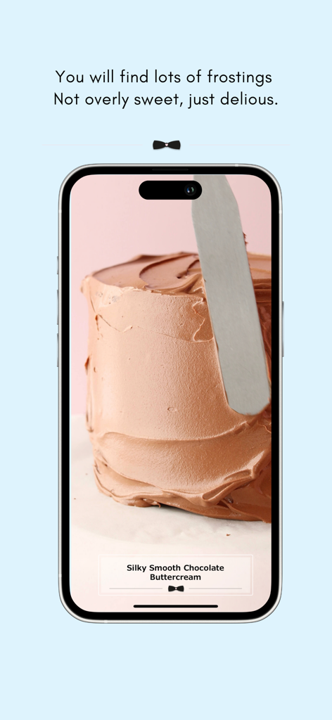 A close-up of silky smooth chocolate buttercream being spread on a cake in the Love Manuela baking app.