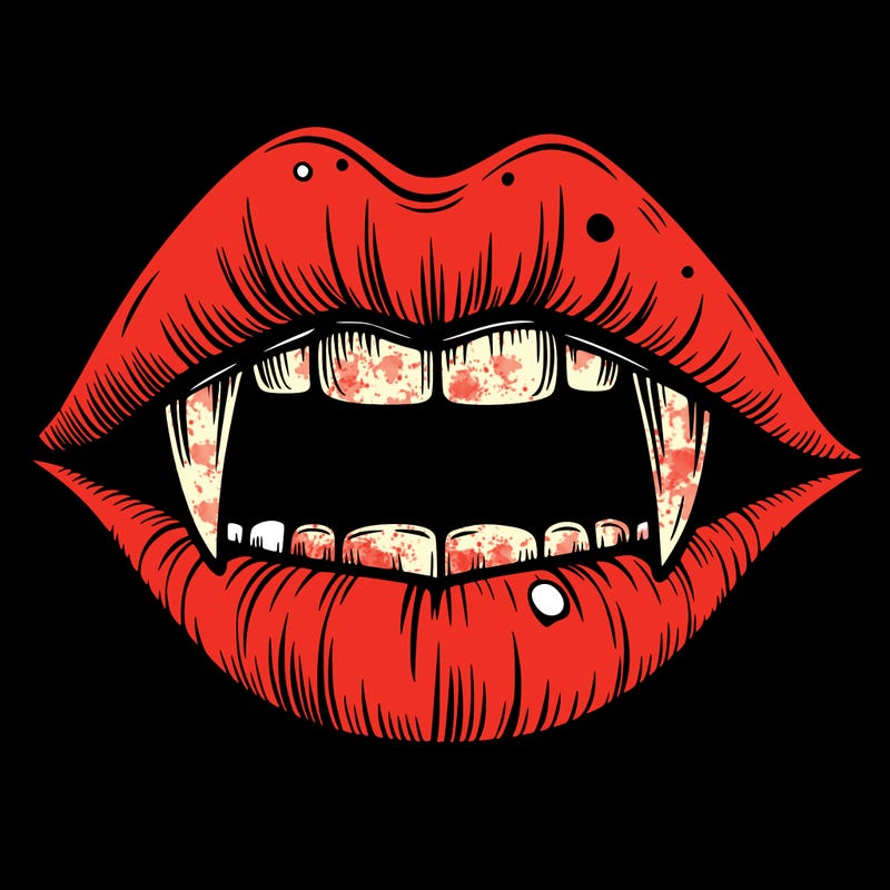 lips with vampire teeth