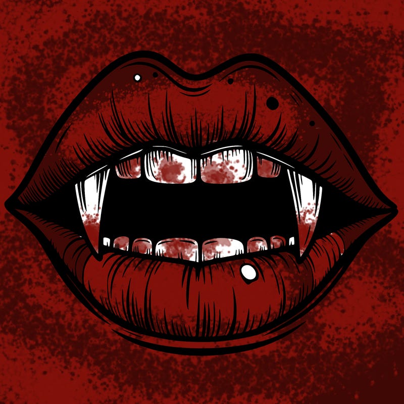 lips with vampire teeth