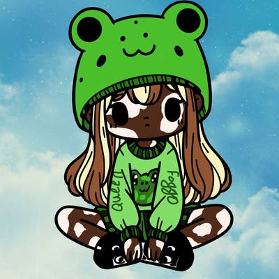 a girl wearing a frog hat and some frog socks