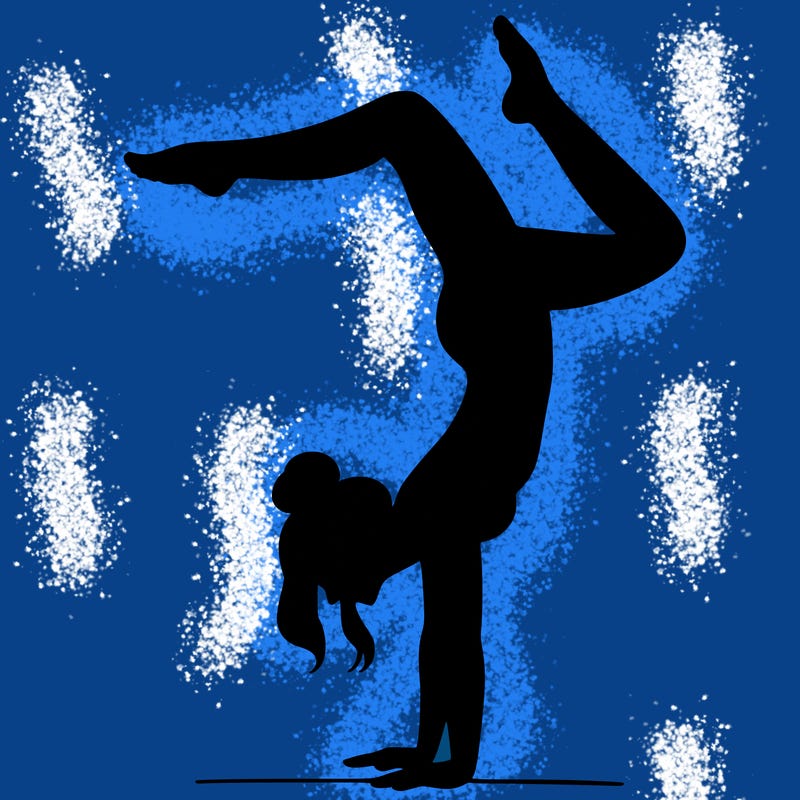 a woman doing a handstand