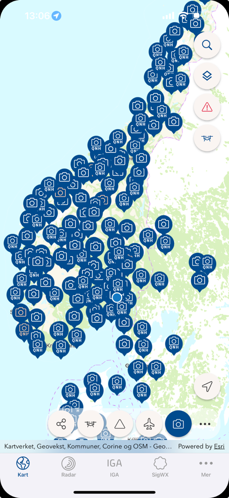 Interactive map in the HemsWX app showing a dense network of aviation weather cameras and QNH pressure stations