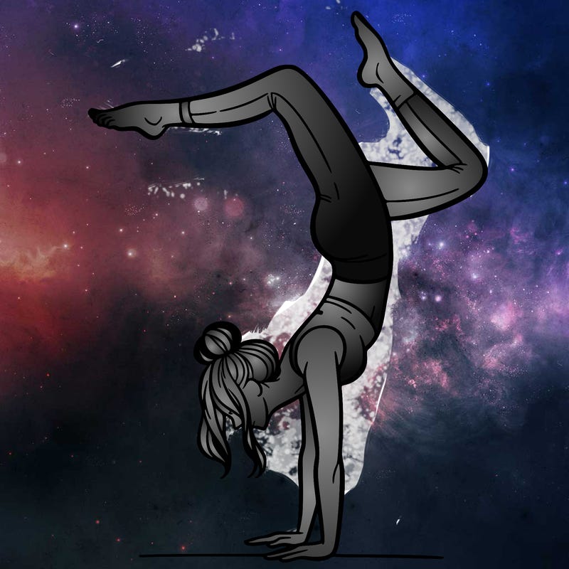 a woman doing a handstand