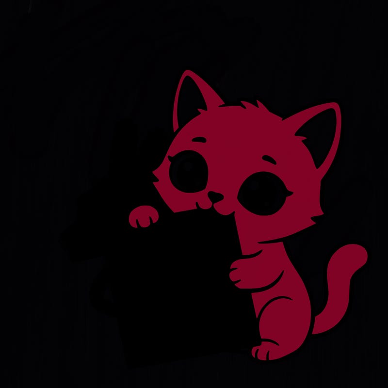 a small cat with a blank sheet of paper in its hand. the cat is sooooooo cute!