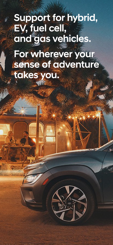 MyHyundai with Bluelink - Un SUV Hyundai estacionado en un campamento desértico por la noche con texto sobre el soporte para vehículos híbridos y eléctricos