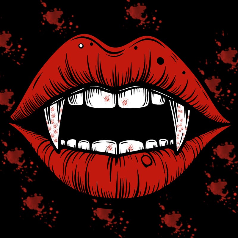lips with vampire teeth