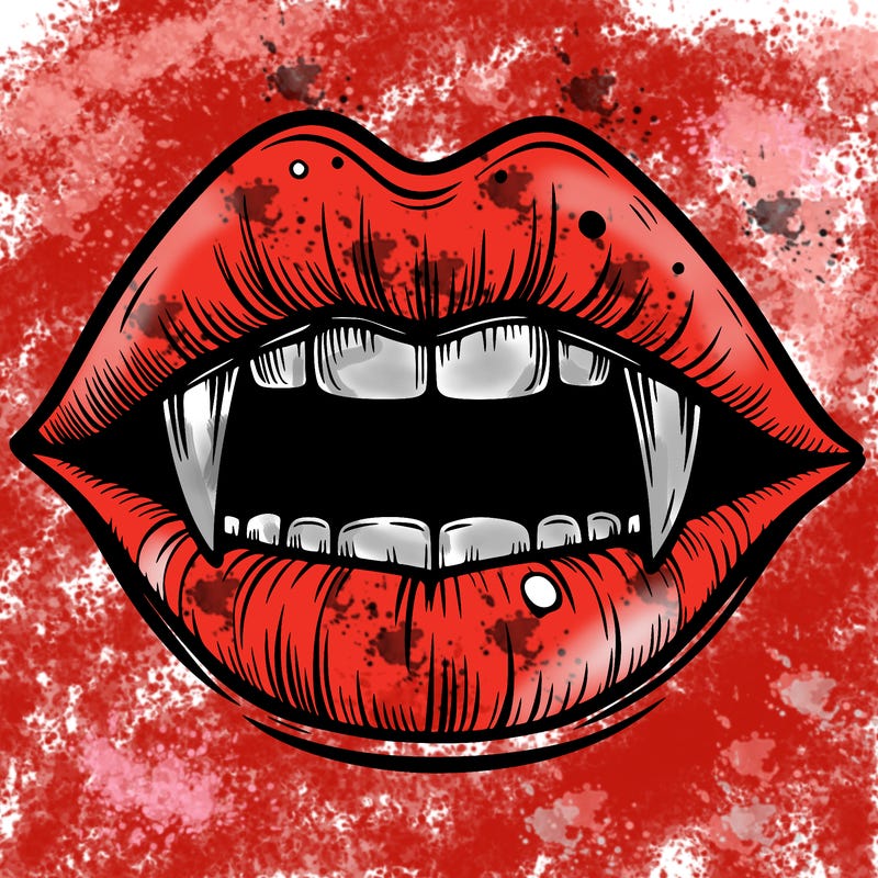 lips with vampire teeth