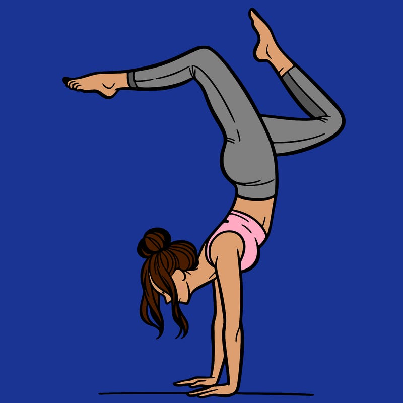 a woman doing a handstand