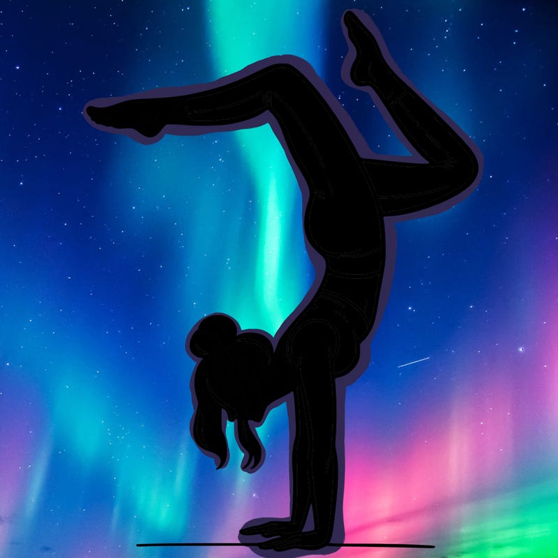 a woman doing a handstand