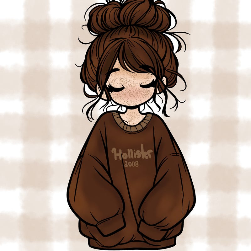 girl with baggy sweatshirt and messy bun
