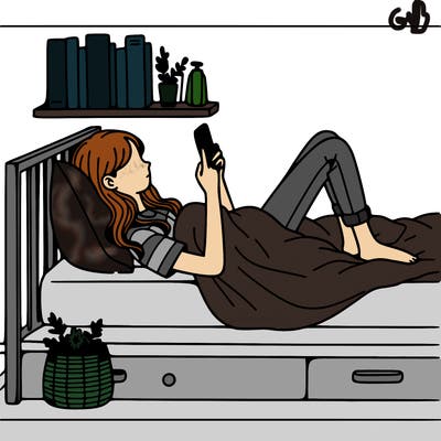 a girl laying on her bed with her phone