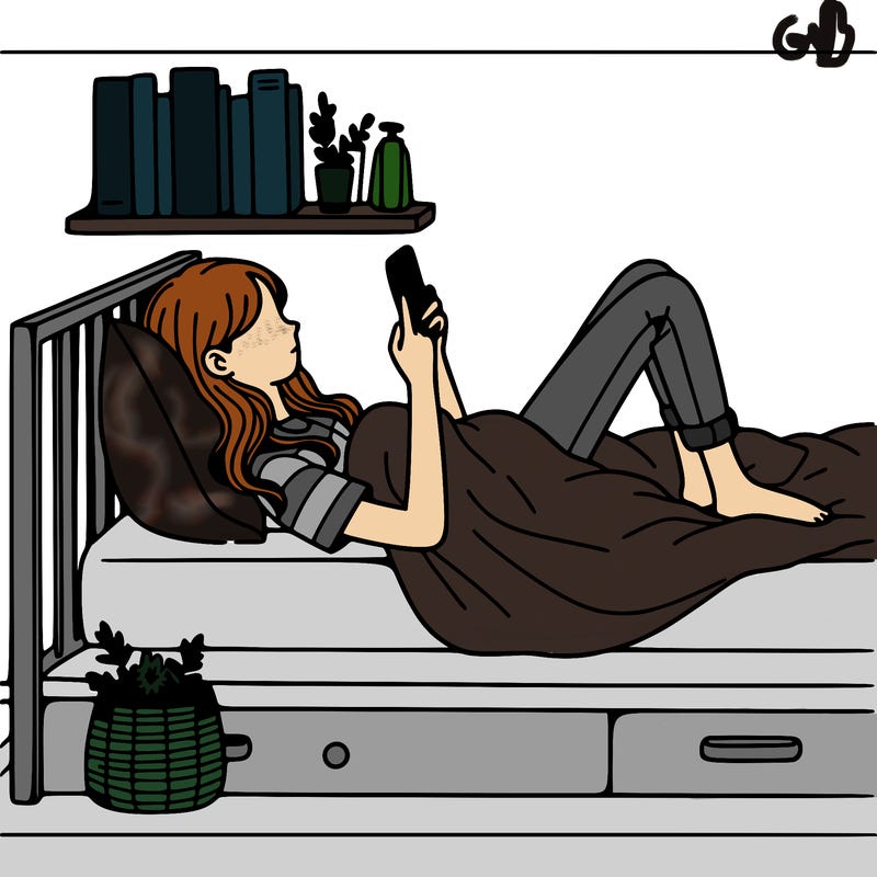 a girl laying on her bed with her phone